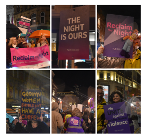 Reclaim the night march in Leeds, people holding up signs saying 'reclaim the night'